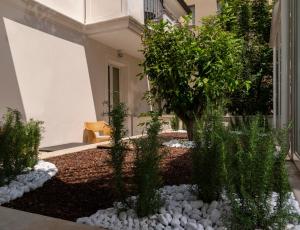 A garden outside Accademia Hotel