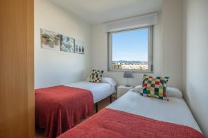 Katil atau katil-katil dalam bilik di Rent Top Apartments Forum