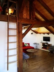 Posezení v ubytování Petit Chalet Vieux Bois