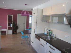 a kitchen with a sink and a counter top at ARLALPIN in Pettneu am Arlberg