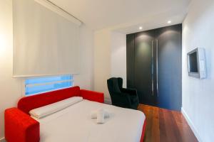 TV a/nebo společenská místnost v ubytování Sea You Hotel Port Valencia