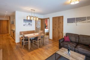 Posedenie v ubytovaní Alphus Appartements