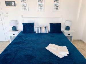 Postel nebo postele na pokoji v ubytování POSEA - Polignano Sea Suites