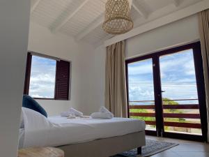 Postel nebo postele na pokoji v ubytování Home Sweet Home Jan Thiel Curacao best view + 37 fotografií