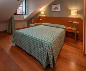 A bed or beds in a room at Astures