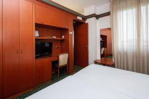 Postel nebo postele na pokoji v ubytování Jet Hotel, Sure Hotel Collection by Best Western