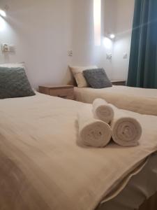 Postel nebo postele na pokoji v ubytování Hostel Mleczna - Metro Zacisze