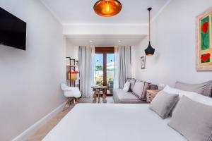 Krevet ili kreveti u jedinici u okviru objekta Hesperides Hotel Pefkochori