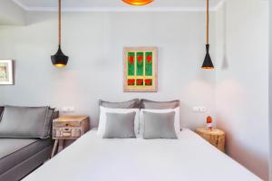 Krevet ili kreveti u jedinici u okviru objekta Hesperides Hotel Pefkochori