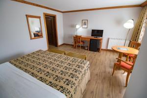 Cama ou camas em um quarto em Hotel Kosten Aike
