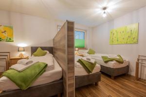 Posteľ alebo postele v izbe v ubytovaní Apartments Grillstube