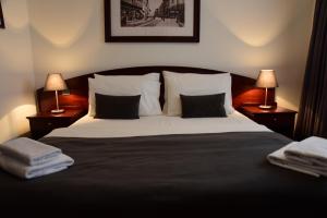 Posteľ alebo postele v izbe v ubytovaní Hotel Meridijan16