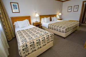 Cama ou camas em um quarto em Hotel Kosten Aike