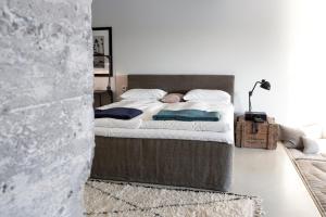 Ένα ή περισσότερα κρεβάτια σε δωμάτιο στο Speicher7 Hotel
