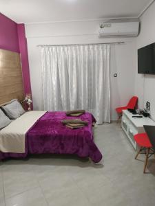 Postel nebo postele na pokoji v ubytování G M 4 ROOMS KENTRO in the heart of the city