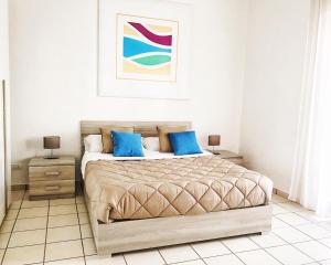 Кровать или кровати в номере Golden Home Sorrento