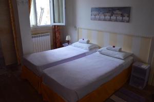 Postel nebo postele na pokoji v ubytování A Casa di Mich
