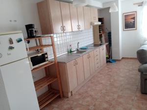 Kuchyňa alebo kuchynka v ubytovaní Arinaga Beach Apartment