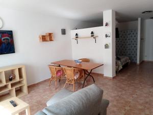Posedenie v ubytovaní Arinaga Beach Apartment