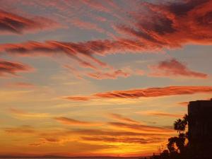 The sunrise or sunset as seen from Az apartmant or nearby
