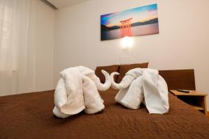 Postel nebo postele na pokoji v ubytování Hostal Conde David