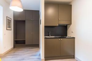 Kuchyň nebo kuchyňský kout v ubytování parina Inn – Locanda
