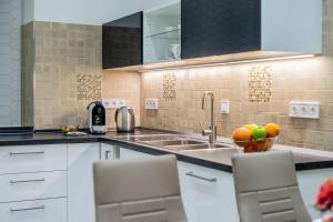 Kuchyňa alebo kuchynka v ubytovaní Global Suites Budapest