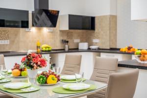 Kuchyňa alebo kuchynka v ubytovaní Global Suites Budapest