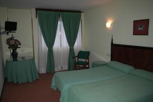 Postel nebo postele na pokoji v ubytování Hotel Canal