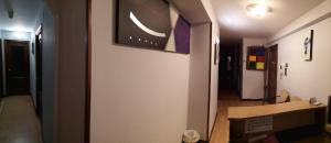 A television and/or entertainment centre at Hostal Campoamor