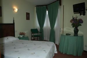 Postel nebo postele na pokoji v ubytování Hotel Canal