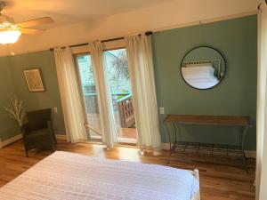 Voodi või voodid majutusasutuse Riverpath Inn toas
