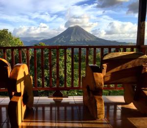 a balcony with a view of a mountain at Casa Torre Eco- Lodge in Fortuna