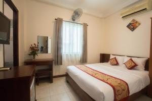 TV a/nebo společenská místnost v ubytování Ngoc Minh Hotel
