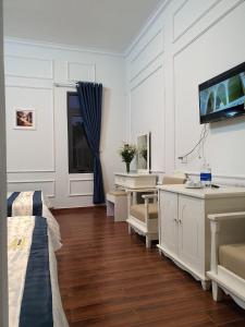 Televiisor ja/või meelelahutuskeskus majutusasutuses Coco Village Phu Quoc Resort