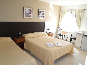 En eller flere senge i et værelse på SAN MARINO