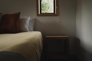 Postel nebo postele na pokoji v ubytování Alpine Lodges