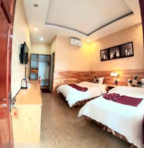 Postel nebo postele na pokoji v ubytování Dang Khoa Garden Inn Homestay