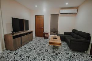TV a/nebo společenská místnost v ubytování Segara Residencias