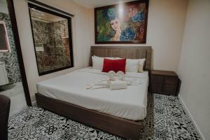 Postel nebo postele na pokoji v ubytování Segara Residencias