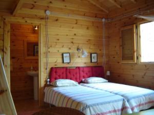 Cama o camas de una habitación en Cabañas Mas de Borràs