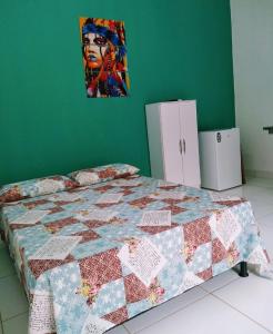Postel nebo postele na pokoji v ubytování villa verde corumbau
