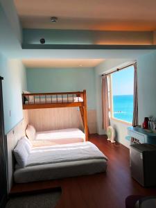 Postel nebo postele na pokoji v ubytování Ocean B&B