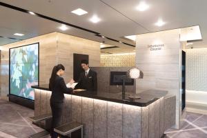 Hotel Granvia Osaka-JR Hotel Group的电视和/或娱乐中心