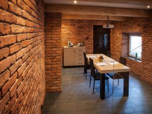 Kuchyňa alebo kuchynka v ubytovaní Hotel Betmanowska Main Square Residence Adults Only