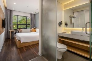 Phòng tắm tại Magnolia Hotel