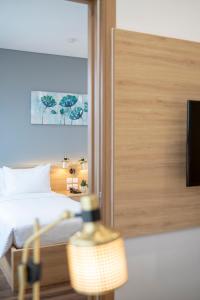 TV/trung tâm giải trí tại Magnolia Hotel
