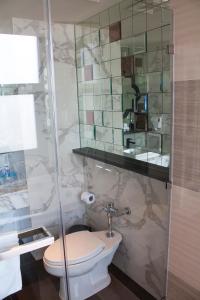 Ein Badezimmer in der Unterkunft Mera Mare Pattaya