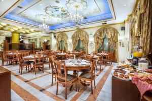 En restaurang eller annat matställe på Imperial Palace Classical Hotel Thessaloniki