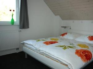Cama ou camas em um quarto em Ferienhaus Nordhorn - Auf Wolke 7 und Seeparadies